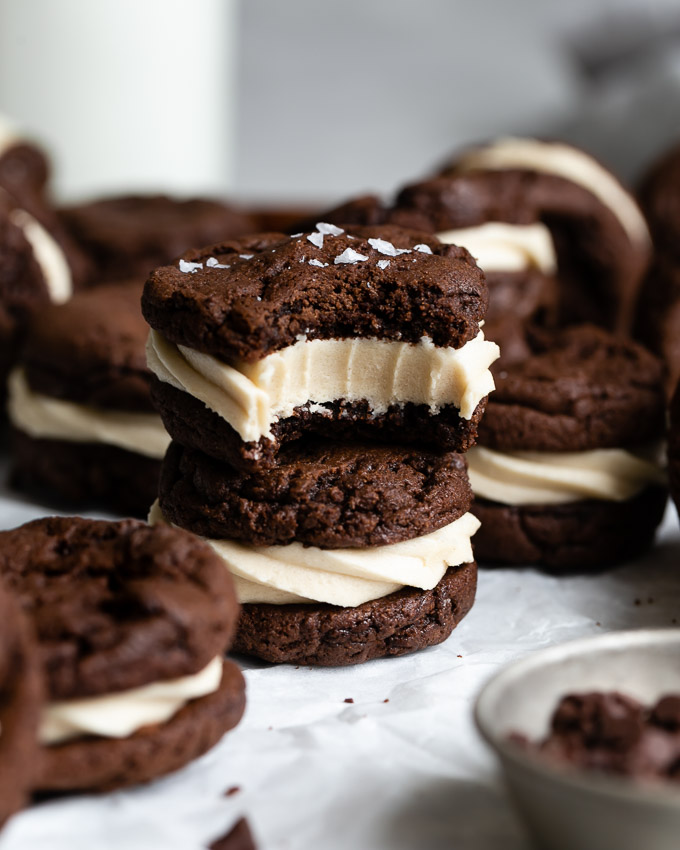 stack of two brownie cookie sandwiches with cookie dough buttercream