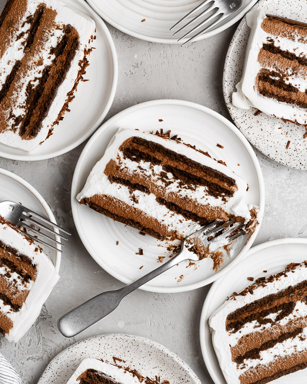 close up of chocolate icebox cake with bite taken out